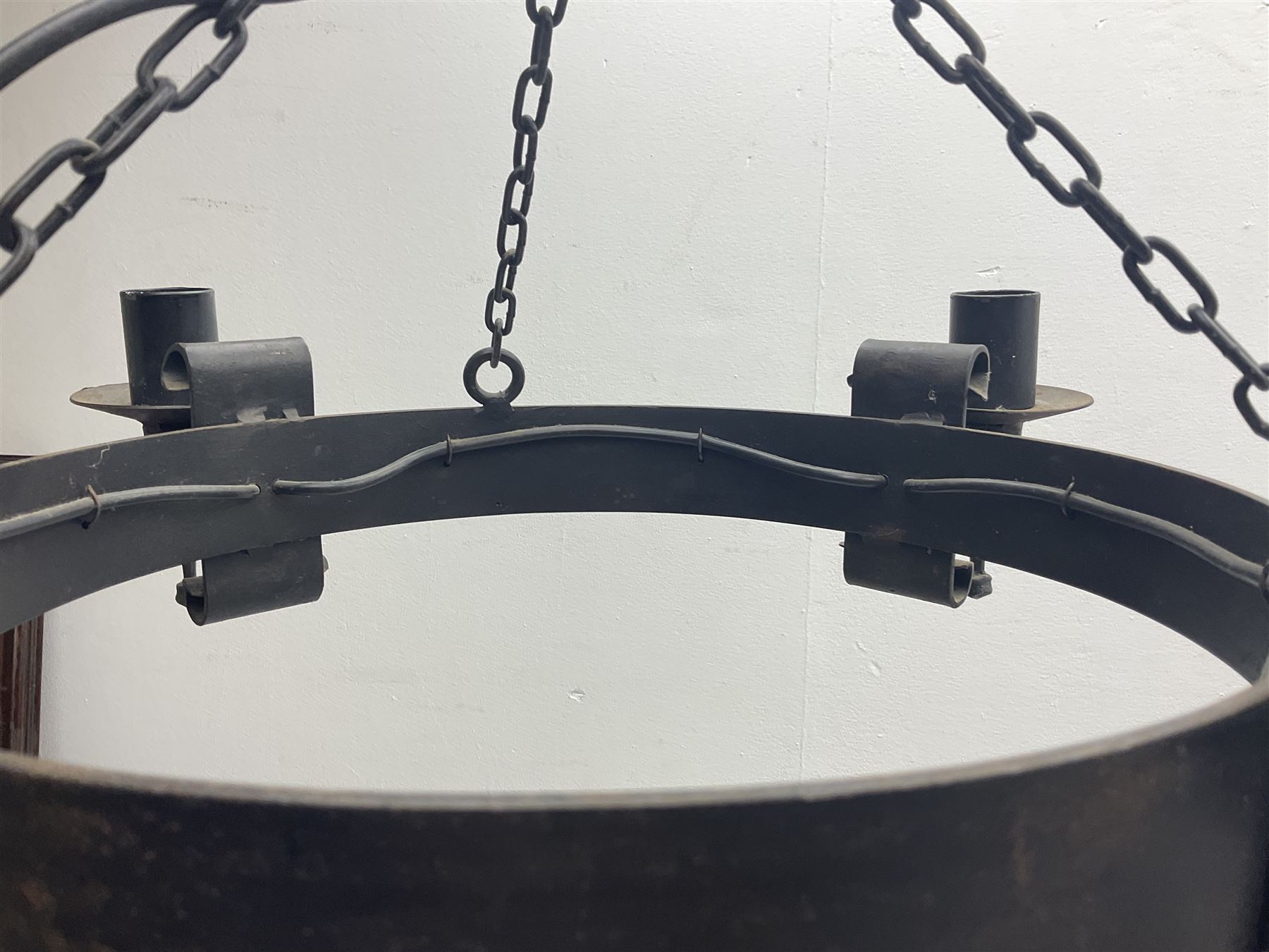 Pair of gothic style wrought iron ceiling lights, each with four branches, D58cm