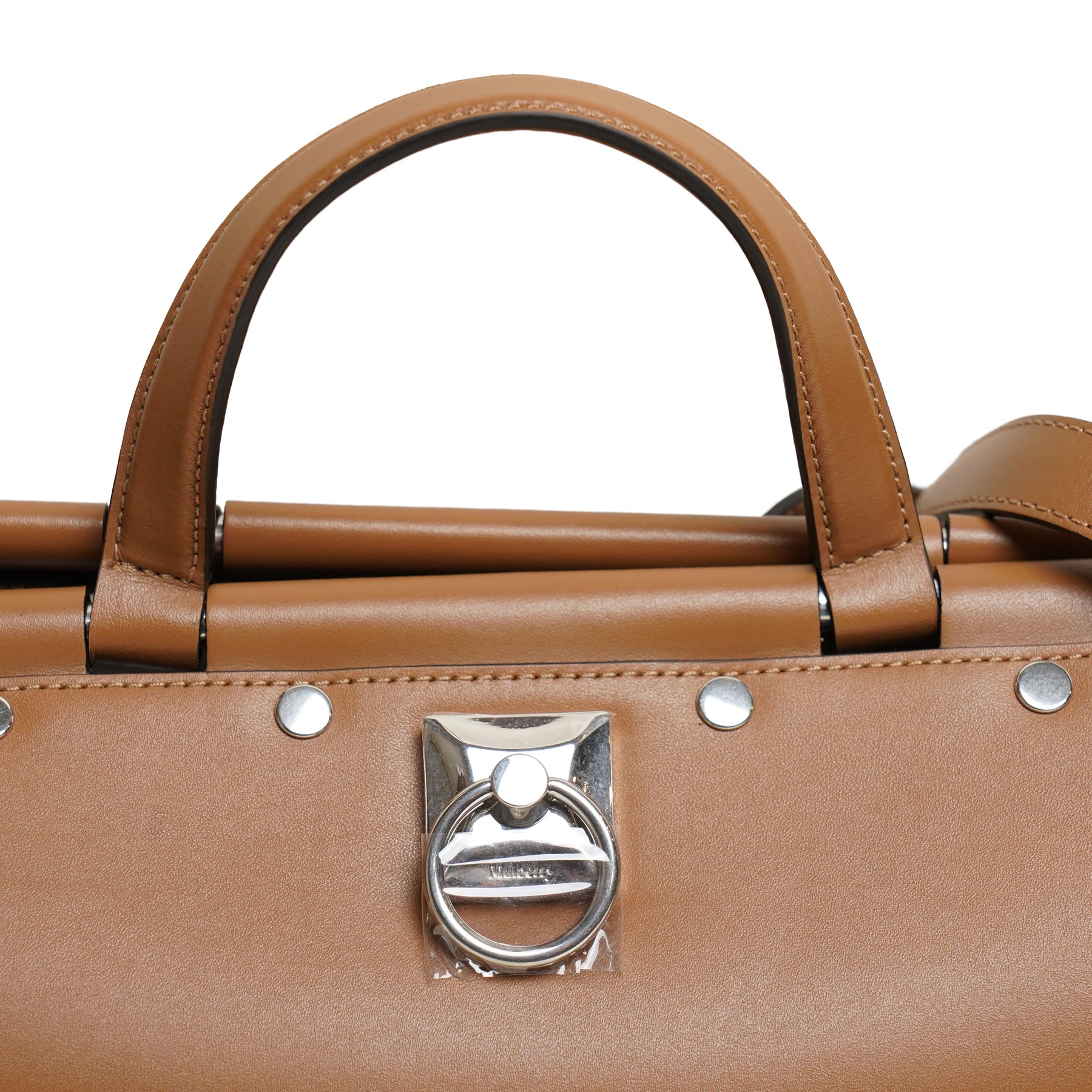 Mulberry - Iris Flat Stud handbag in Teak leather, the structured body with twin top handles and removable shoulder strap, polished silver-tone flat stud detailing and central ring hardware, opening with rolled top bars, with original Mulberry product tag, care booklet and dust bag, unused