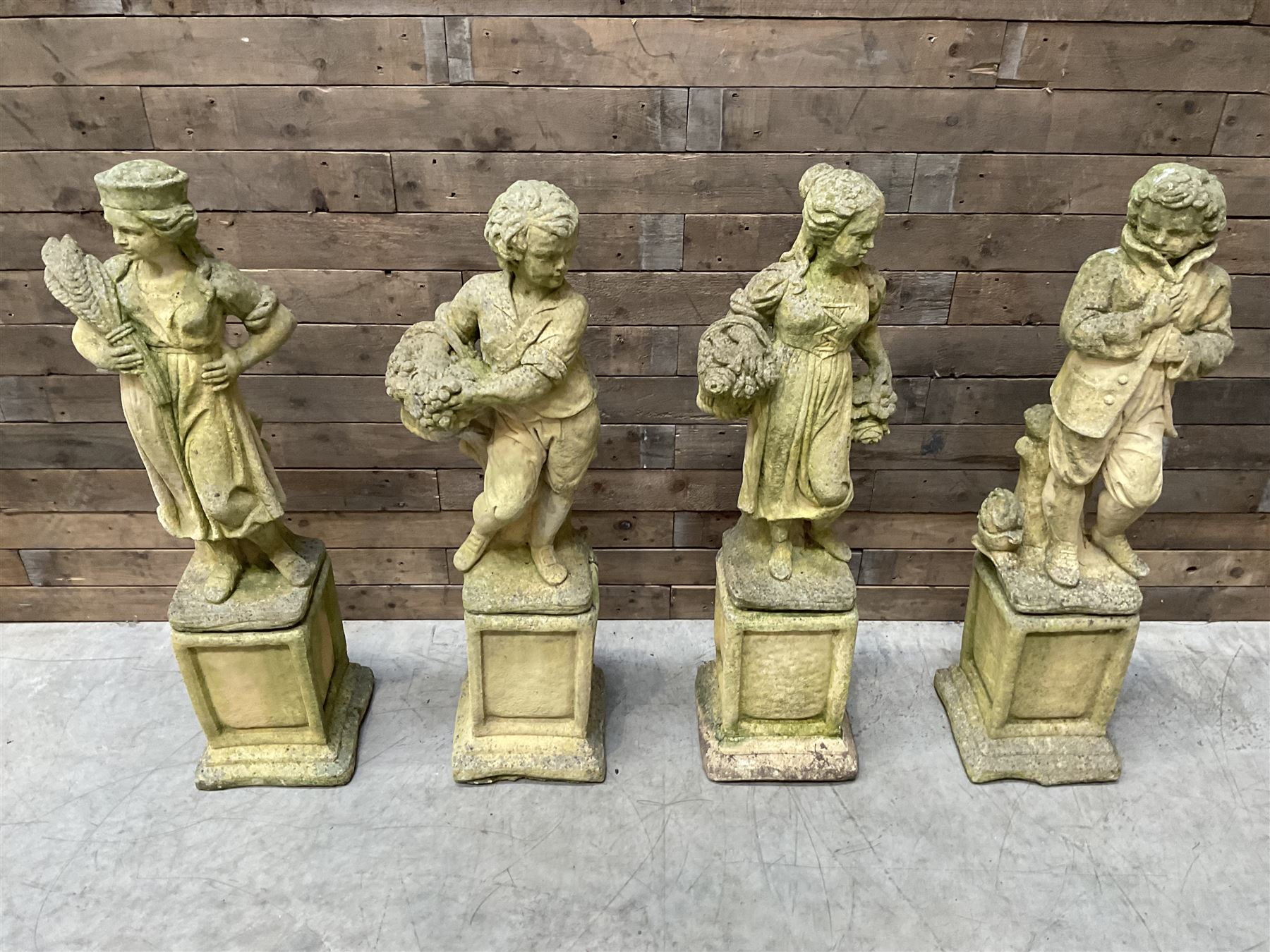 The Four Seasons - set of four cast stone garden figures on plinths