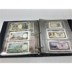 World banknotes, including Queen Elizabeth II The States of Jersey one pound 'DB202703', five pounds 'BB527762' and ten pounds 'AB651481', reserve bank of New Zealand two dollars '1L3 741894', King George V Straits Settlements one dollar 1st January 1935 'F/83 28924', various Bank of England notes etc, housed in two ring binder albums