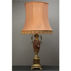  Large gilt metal table lamp, 19th century style, of urn form with simulated polished stone body, scrolled arms on square base with four scroll feet, H57cm of main body  