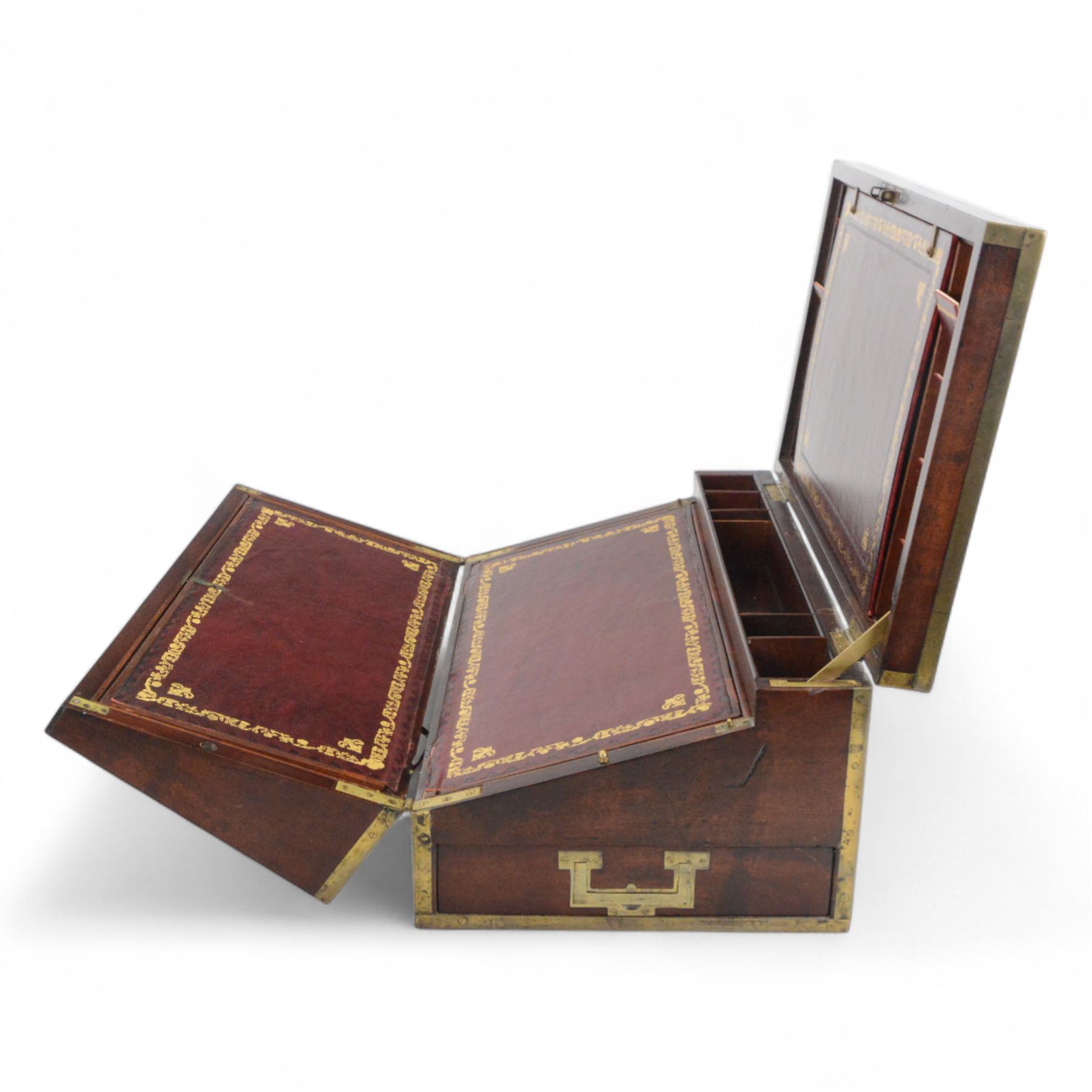 19th century brass bound mahogany writing slope with twin drop carry handles to sides, the hinged cover opening to reveal a  gilt tooled burgundy leather slope and compartmented interior, H22xm W50.5cm D30cm