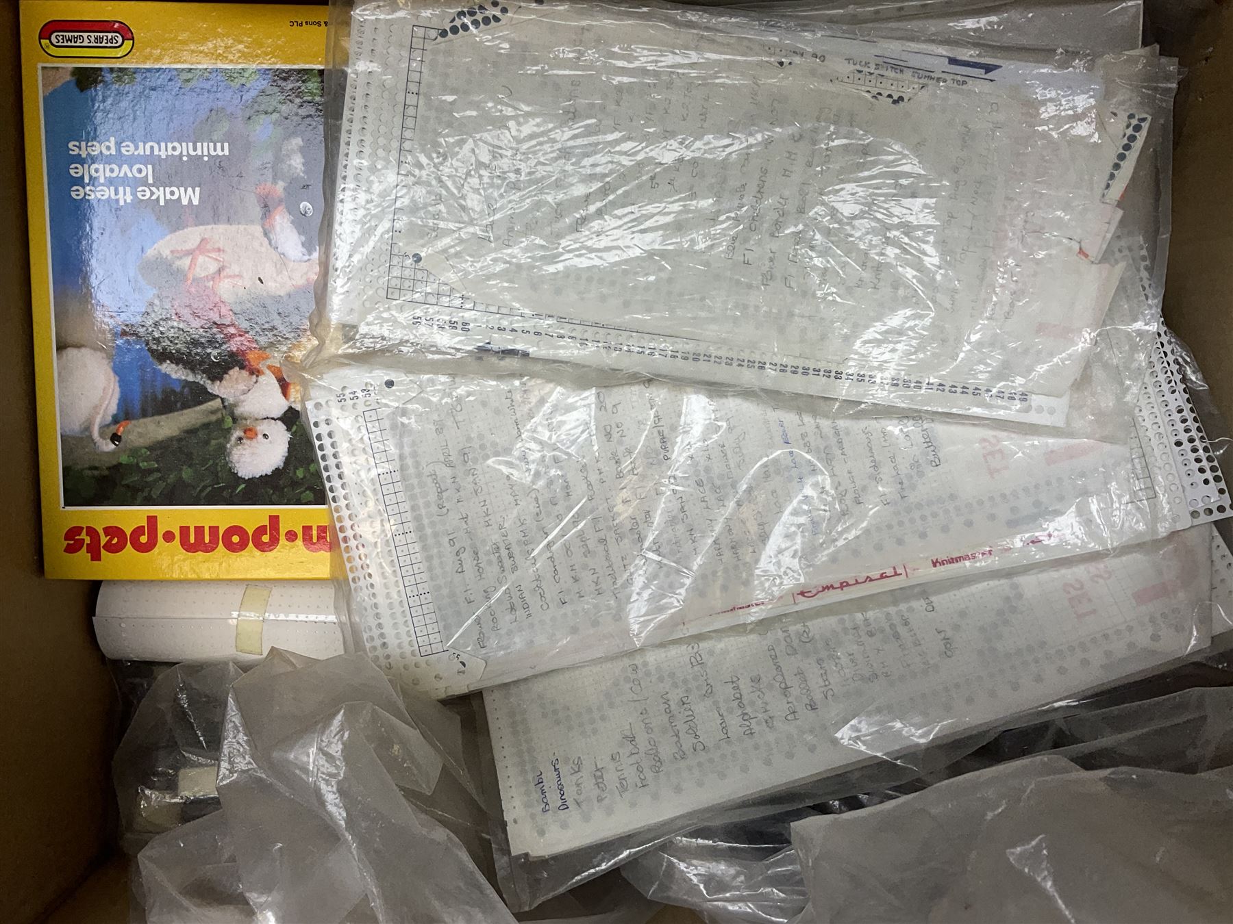  Brother cased knitting machine model KH-890 together with Brother Ribbing attachment model KH-850, knitting machine yarn cones in assorted colours, selection of knitting patterns etc