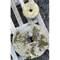 Two 19th century stone mill wheels D64cm and D33cm - THIS LOT IS TO BE COLLECTED BY APPOINTMENT FROM DUGGLEBY STORAGE, GREAT HILL, EASTFIELD, SCARBOROUGH, YO11 3TX