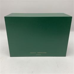 Rolex green leather box, with decorative pleated panel to cover, opening to reveal cream velvet interior, the inside lid stamped Rolex with gilded crown logo, printed mark beneath 'Rolex SA Geneve Swiss 39139.64, together with Rolex note paper in box, box H7.7cm