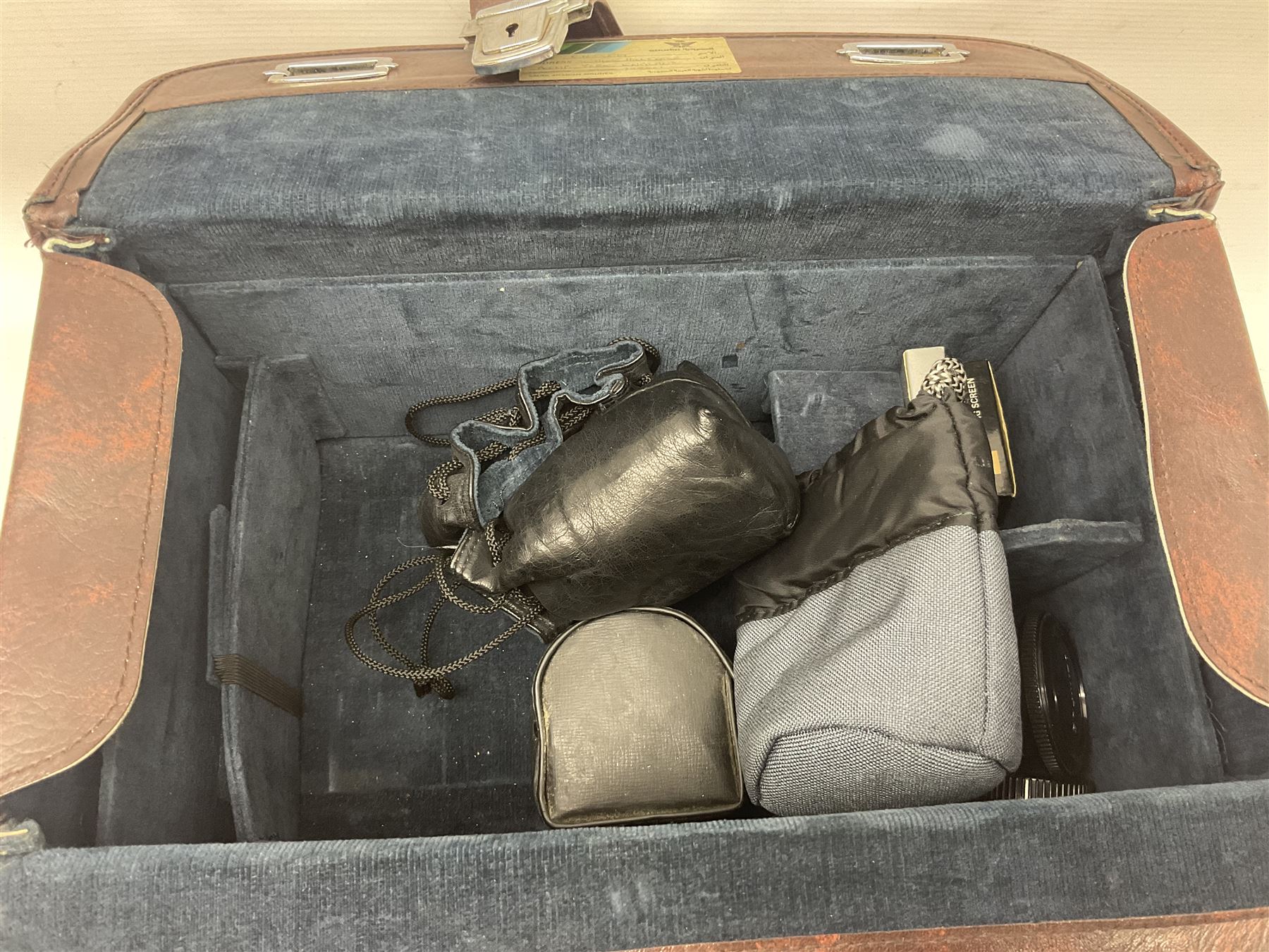 Olympus OM-2 camera body, serial no 1117526, with Olympus OM-System Zuiko Auto-W 28mm 1:2.8'  lens serial no 336591, Olympus OM10 camera body serial no 2392257, with Olympus OM-System Zuiko Auto-Macro 50mm 1:3.5' lens serial no 225784, Soligor C/D mirror lens 1:8 f=500mm' serial no 784035650 together with other camera equipment 