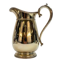 Modern silver plated Barker Ellis pitcher, with oblique gadrooned rim and acanthus capped C scroll handle, an egg coddler with part fluted body and urn finial and other silver plated items including toast rack, two serving dishes, etc, coddler H23.5cm