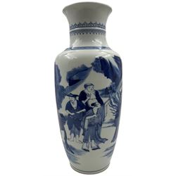 A Chinese blue and white Qing dynasty style vase, painted in underglaze blue with figures in a rocky landscape, six character Kangxi type mark to base, H34cm