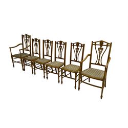 Set six (4+2) Edwardian satinwood dining chairs, triangular cresting rail painted with laurel wreath, shaped and pierced splat flanked by two shaped upright rails, with boxwood stringing, upholstered seats, on square tapering front supports with spade feet