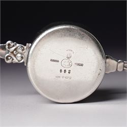 Georg Jensen sterling silver spirit measure of Art Deco design with flattened handle and a silver sugar caster Birmingham 1959