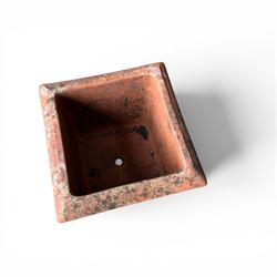 Collection of five terracotta garden planters along with rectangular sandstone trough 