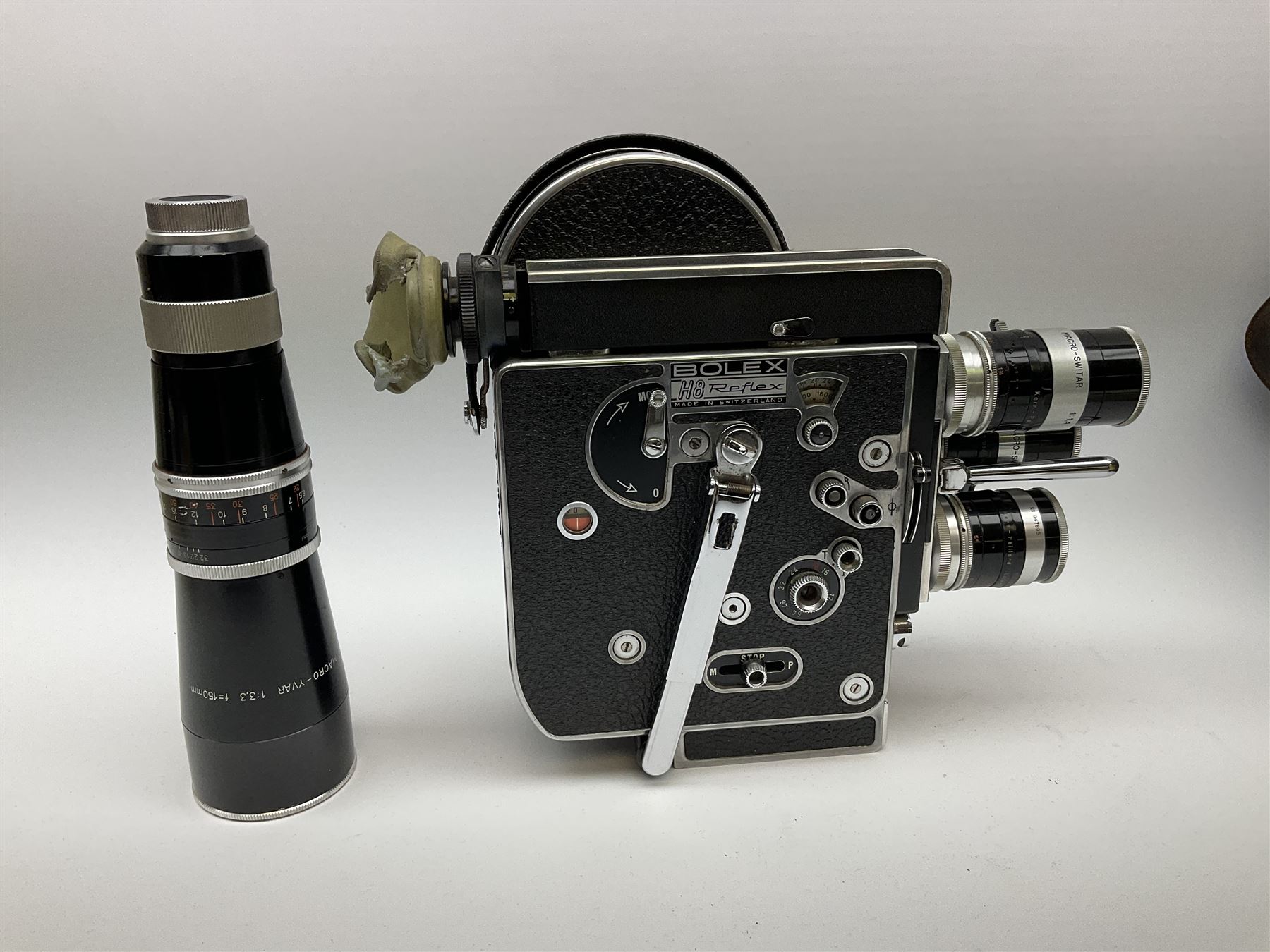 Bolex H8 Reflex 8mm cine camera with handgrip and turret for interchangeable lenses, KERN macro-switar 1:1,4 f=36mm H8 RX lens, KERN macro-switar 1:1,3 f=12,5mm H8 RX lens, KERN macro-switar 1:1,6 f=5,5mm H8 RX lens, KERN MACRO-YVAR 1:3,3 f=150mm lens 