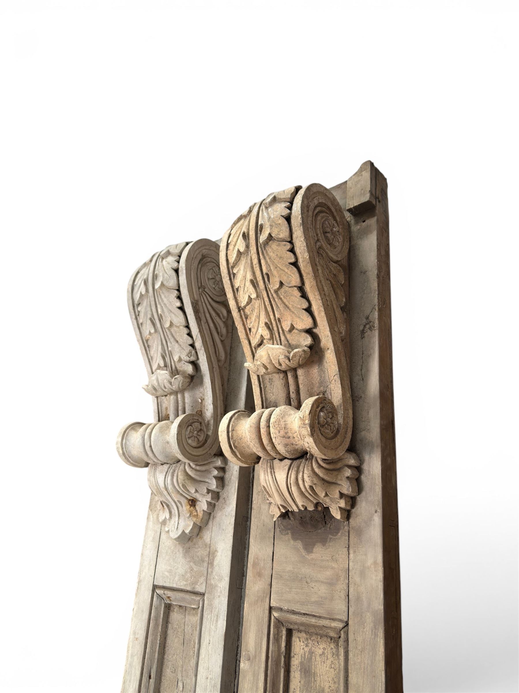 Pair of 19th century pine architectural pilasters, with painted terracotta capitols, with acanthus and scroll detail (18cm x 15cm x 57cm)