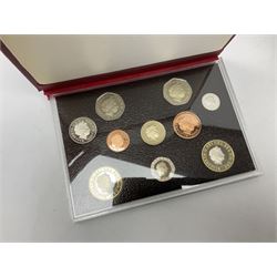 Thirteen The Royal Mint United Kingdom proof coin collections, dated 1985, 1986, 1988, two 1989, 1990, two 1991, 1995, 1996 and 1997, with certificates, 2002 and 2004 without certificates, all in red folders
