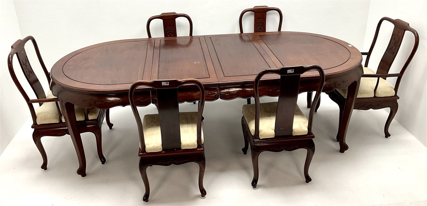 Chinese rosewood extending dining table, two leafs, shaped apron, carved, reed and tapering supports (W246cm, H78cm, D117cm) and set six (4+2) dining chairs, shaped cresting rail, carved splat, upholstered seat, tapering supports (W57cm)