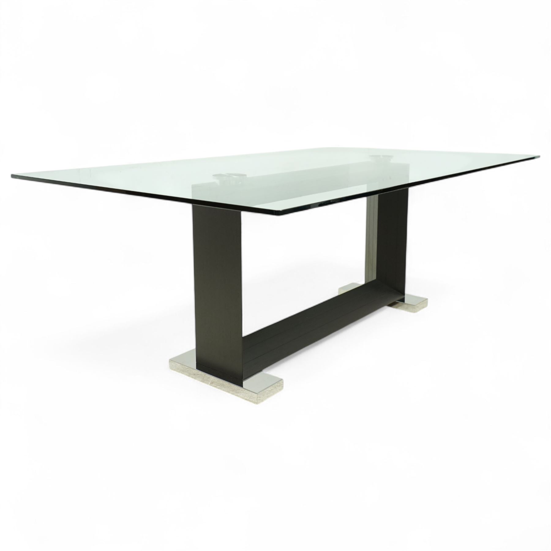 Cattelan Italia - Monaco glass top dining table on wenge base, bevelled and rounded edge clear glass top supported by twin angled black veneered uprights on a rectangular stretcher base, raised on brushed steel foot plates