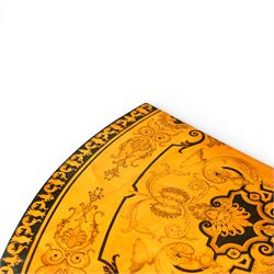 20th-Century Louis XVI-Style satinwood and penwork circular table or pair of console tables, the circular quarter-veneered top decorated in penwork with a central classical mask head motif within scrolling foliate and anthemion ornament on a contrasting black ground, above a conforming frieze decorated with Greek key-type scrolls. Raised on square tapering legs, each with an upper block panel decorated with compass-star motifs.