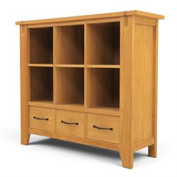 Contemporary Oak cabinet, rectangular top with tenon detailing, two open recess shelves, above a single drawer with blackened metal handles