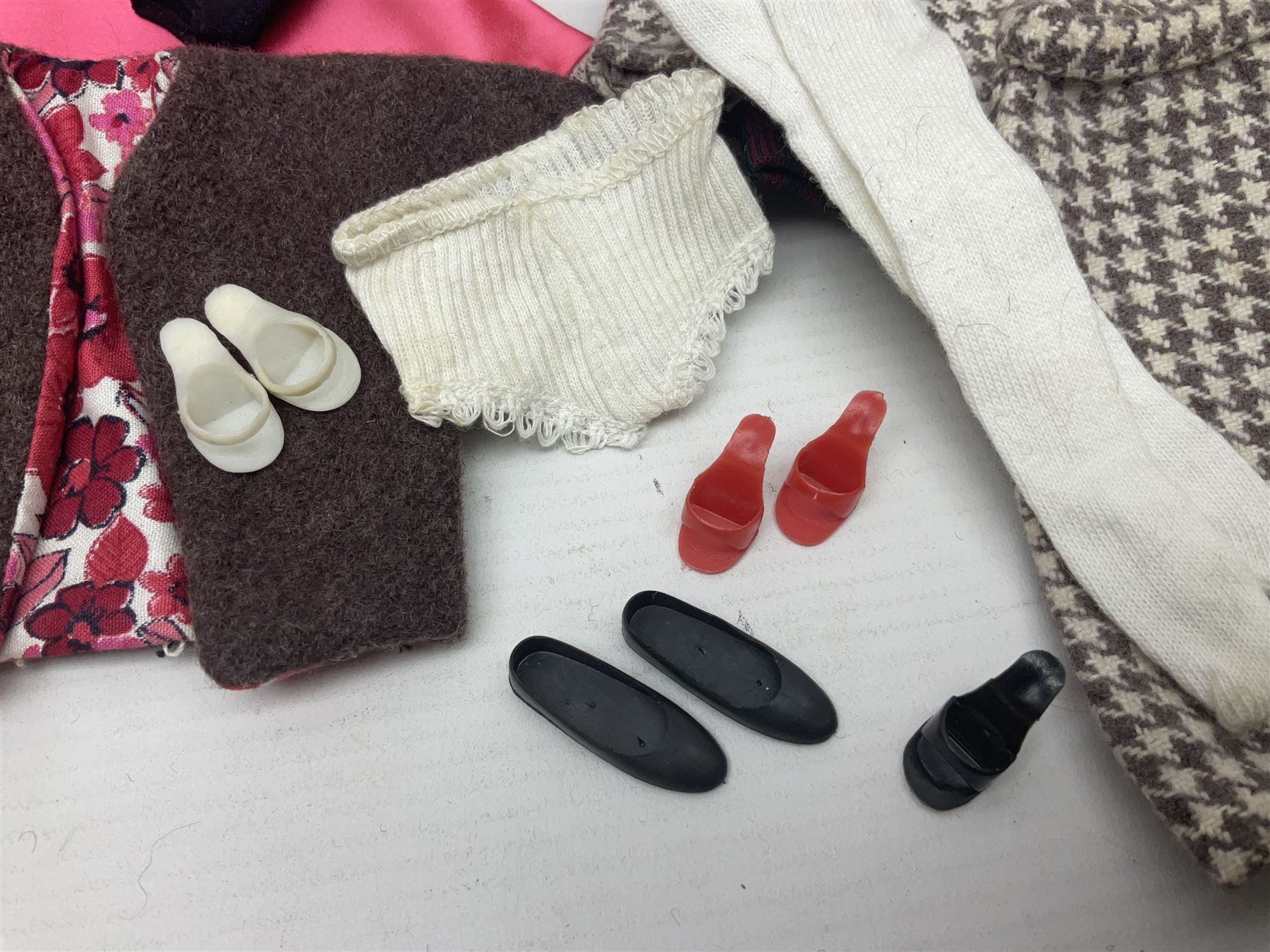 Two 1960s Mattel Barbie fashion dolls - 'Ski Queen' and 'Career Girl'; each in original decorative box with paperwork; and a quantity of Mattel and other fashion doll clothing