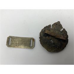 Made-up group of three WWI medals comprising 1914 Star awarded to 23598 Gnr. F. Jefferson R.G.A., British War Medal and Victory Medal with names removed; with ribbons on wearing bar; 1942 Motorist's Medal and small quantity of cap badges, Royalty badges etc