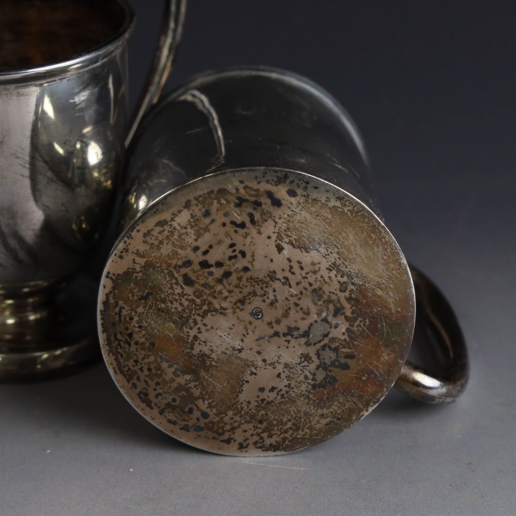 Two early 20th century silver christening mugs, both with engraved initials, both hallmarked, tallest H7.5cm