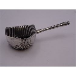 Late 19th century American silver strainer, the bowl of circular part fluted form, with foliate embossed detail, gilt interior with pierced strainer, and foliate detailed handle to side, marked beneath Sterling 925/1000, with makers mark for Foster & Bailey