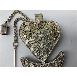 Eastern white metal scent bottle of heart form, above a crescent moon and petal shaped base with hanging chain and pin, L10cm