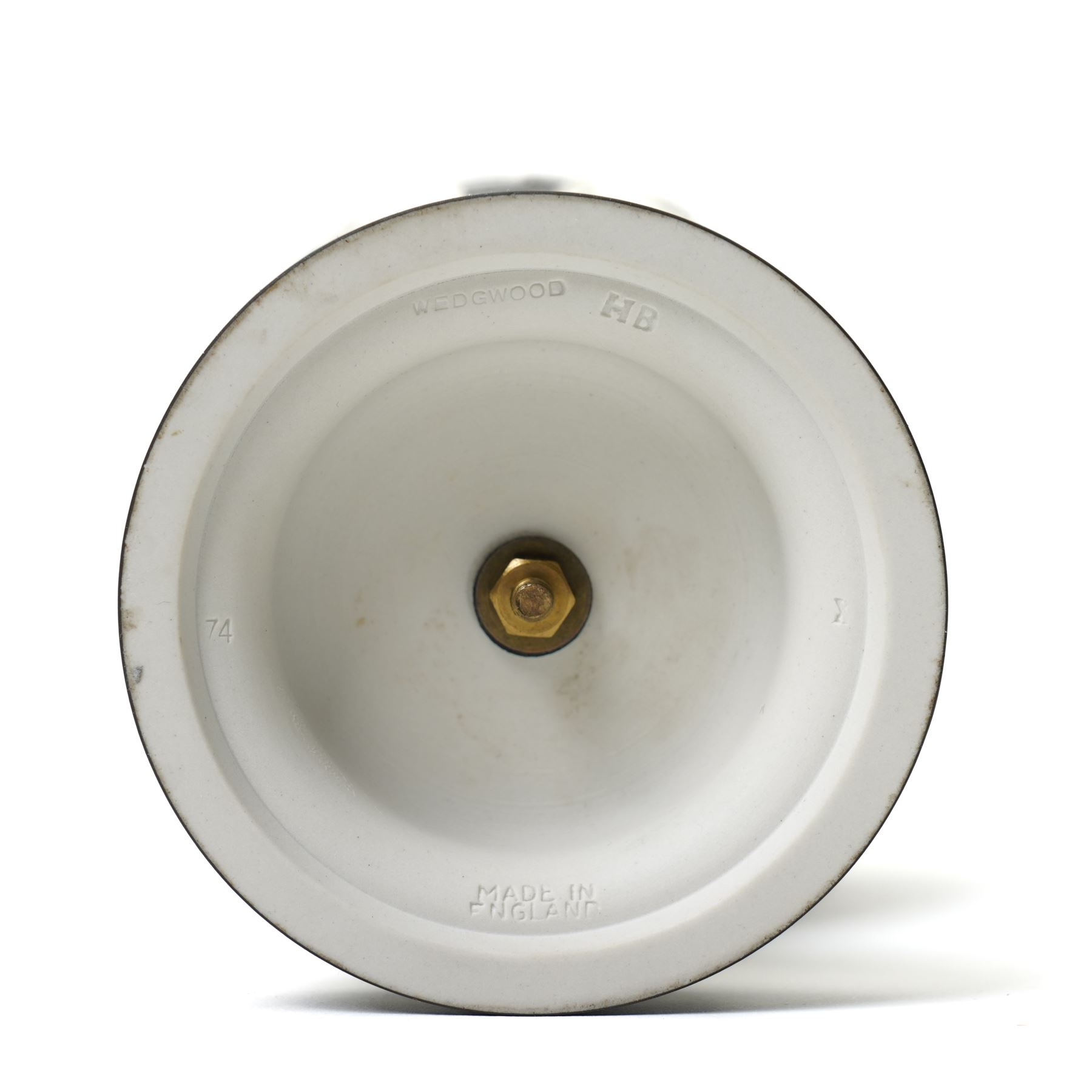 Wedgwood 20th century 'Dancing Hours' jasperware urn, the upper section decorated with a single band of neoclassical maidens in white to a black basalt ground, rising from a circular plinth decorated with foliate motifs, complete with cover with acorn finial, stamped 'Wedgwood Made in England', H25cm 