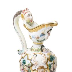 Capodimonte vase and cover decorated with a raised pattern of cherubic figures H32cm, another vases and cover with panels of figures H33cm, bowl and cover with similar decoration D20cm and two other Capodimonte pieces (5)