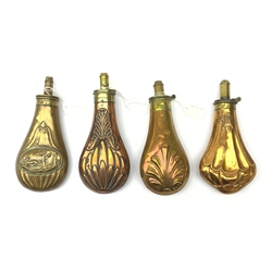 Four Victorian copper and brass powder flasks, three marked 'Patent', one embossed with a gun dog in a landscape scene, the others with stylised shells, leaves or fluting, largest H20cm (4)