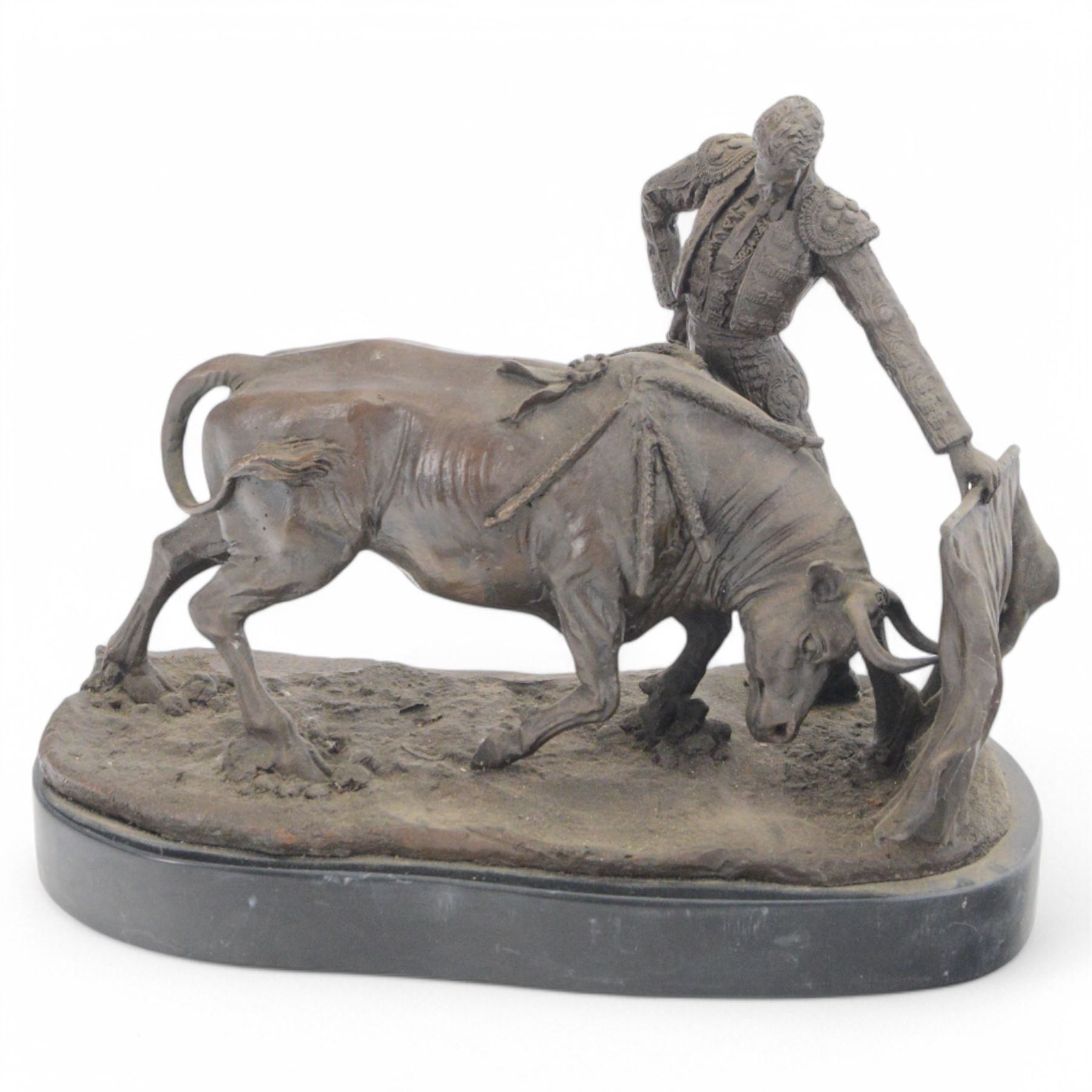 Bronzed figure of a matador and charging bull, signed Mene to the base, H21cm