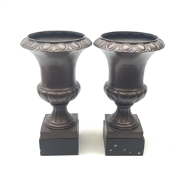 Pair classical bronze style urns on bases, H49cm