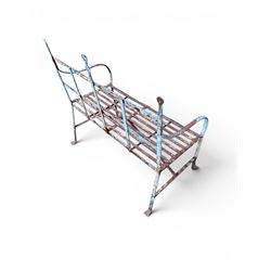 Regency period wrought iron strapwork garden bench, cresting rail with central Scottish thistle motif and flanking pediments, in distressed blue painted finish