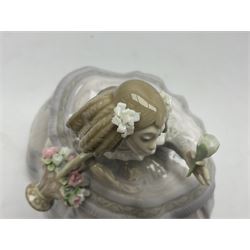 Lladro figure, Teresa, modelled as a lady in a crinoline dress with a basket of flowers, sculpted by José Puche, with original box, no 5411, year issued 1987, year retired 1989, H15cm