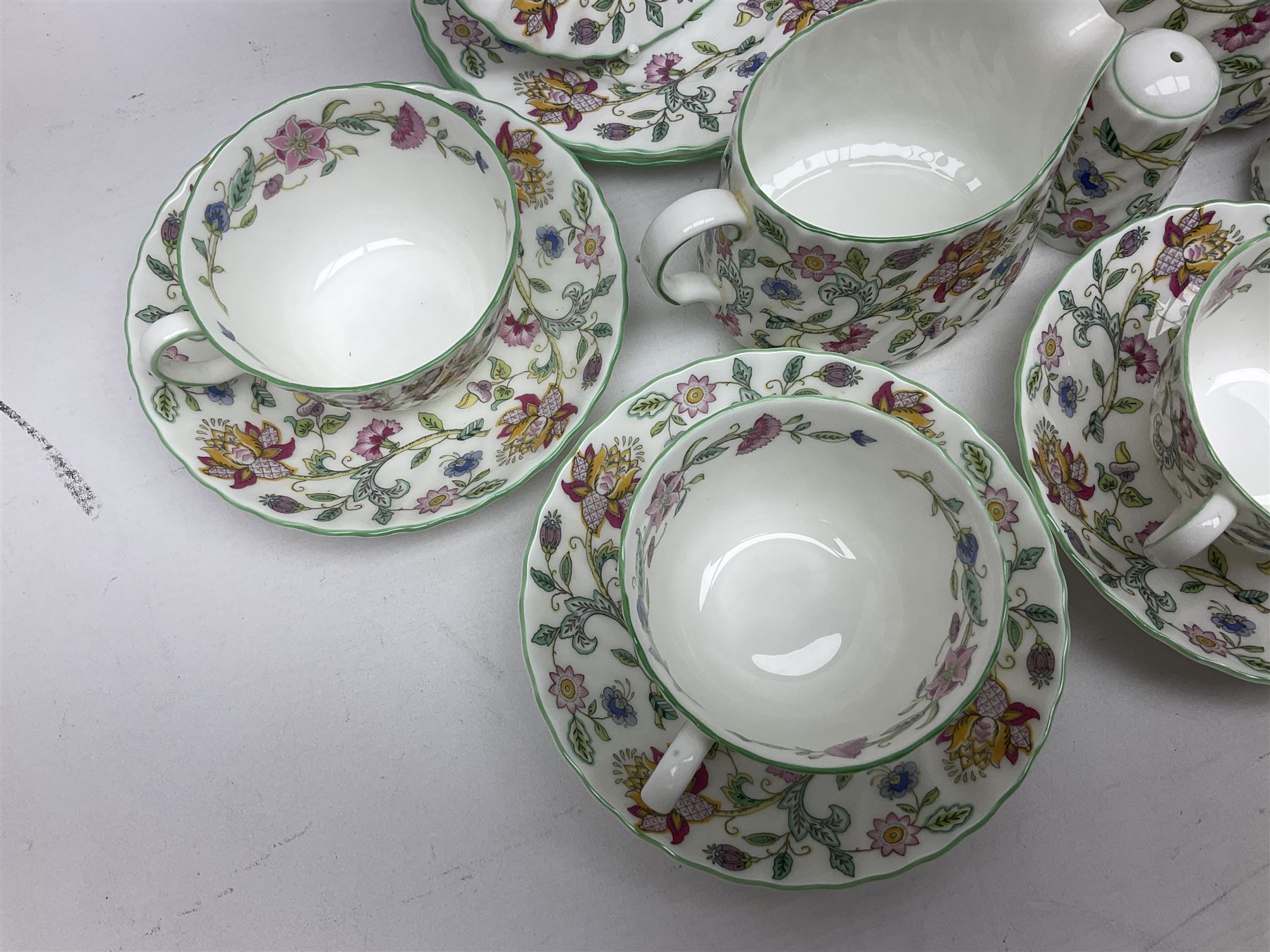 Haddon Hall tea service for six, comprising teapot, open sucrier, milk jug, cups and saucers, dessert plates, one cake plate and cruet set 