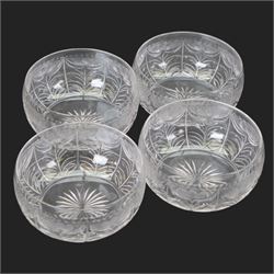 Six cut glass goblets, each with etched and cut floral decoration, together with eight similar bowls, a pair of Waterford Crystal glasses, eight champagne coupes etched with Greek Key border and four etched with floral border