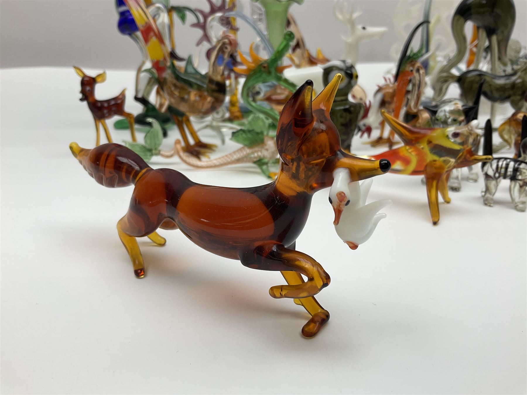 Large collection of hand-blown glass animals and figures, to include fish, birds, cats, dogs, monkeys etc