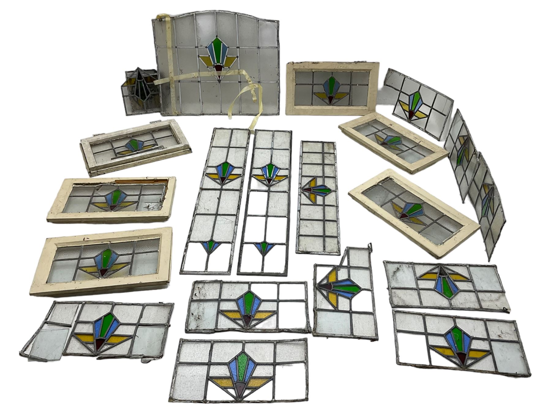 1930s external door with stained leaded glass panel (86cm x 203cm), six small stained glass windows in wooden frames (W52cm); and various loose stained leaded glass panels