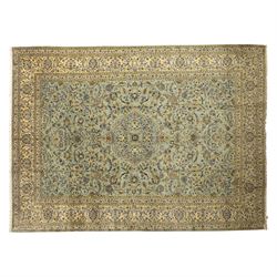 Central Persian Kashan hand-knotted carpet, pale celadon blue ground, decorated with an al...