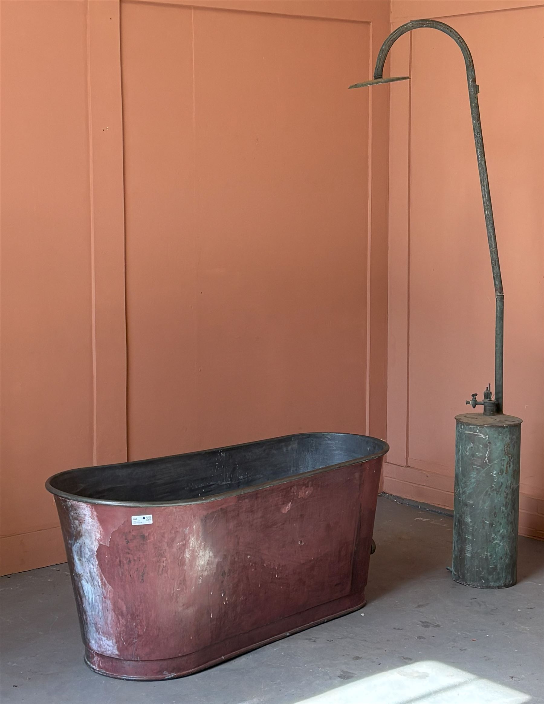 French copper bath  (L144cm W64cm H62cm) together with a primitive plunger shower. (H227cm) - COLLECTION BY APPOINTMENT FROM: The White House, Thirsk Road, Easingwold, York, YO61 3NF - CALL 01723 507111 TO ARRANGE