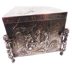 Late 19th century German Hanau silver mounted cigarette box, of rectangular form, the sides and cover repousse decorated with genre scenes, the cover edge engraved 'The Officers 3rd Batt East Yorkshire Regt from Colonel Brooke', opening to reveal a soft wood lined interior and gilding to underside of cover, the whole upon four feet modelled as Caryatids, with Hanau marks for Neresheimer, F import mark, and hallmarked Samuel Boyce (or Boaz) Landeck, Sheffield 1897, H10cm including feet W23cm D13cm