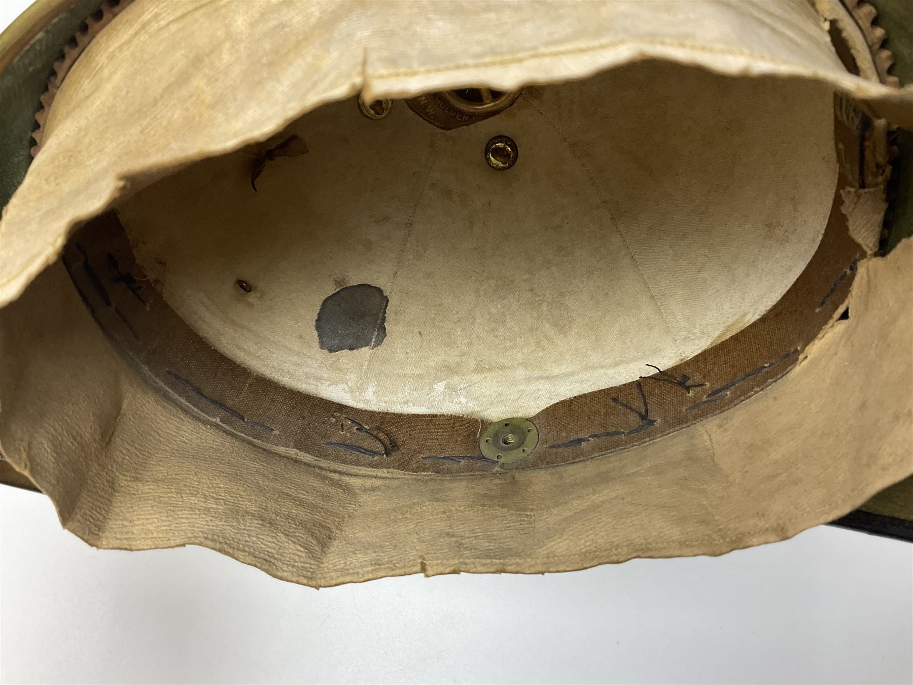 Post-1902 Welsh Regiment Officer's Home Service Blue Cloth Helmet with gilt metal King's crown helmet plate to the front, a removable spike to the top on a shaped cruciform base with rosette fittings, rosette side bosses, brass trim to the front peak, and leather and velvet backed chin scales, with sweat band, the interior with the remains of a makers label at the address 1,3 & 5 Lexington Street, Golden ? London W (presumably Hobson & Sons)