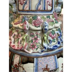 Large pair of 19th century Cantonese famille rose vases, each painted with various courtly scenes, including a display of warriors fighting on horseback before an official and his attendants, double Buddhist lion handles and applied at the shoulders with chilong, the lower band painted with Greek key motif, H58cm (2)