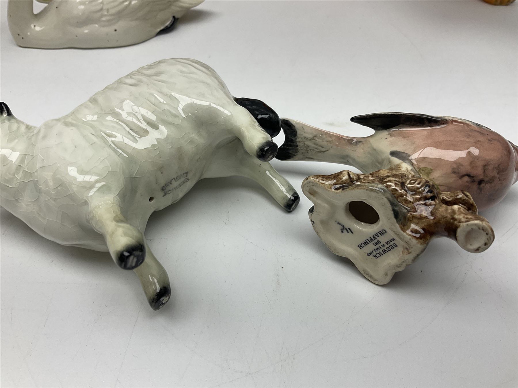 Group of Beswick figures to include leopard no 1082, rabbits, swan, pheasant no 1226 etc, all with marks beneath