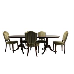 Regency design walnut twin pedestal extending dining table, rectangular burr top with rounded corners and crossbanding, raised on turned vasiform columns with tripod base, with additional leaf (D107cm W184cm/230cm, H76cm); and set eight (6+2) shield back dining chairs, upholstered in striped laurel green fabric, raised on tapering supports with spade feet, retailed by Geoffrey Benson