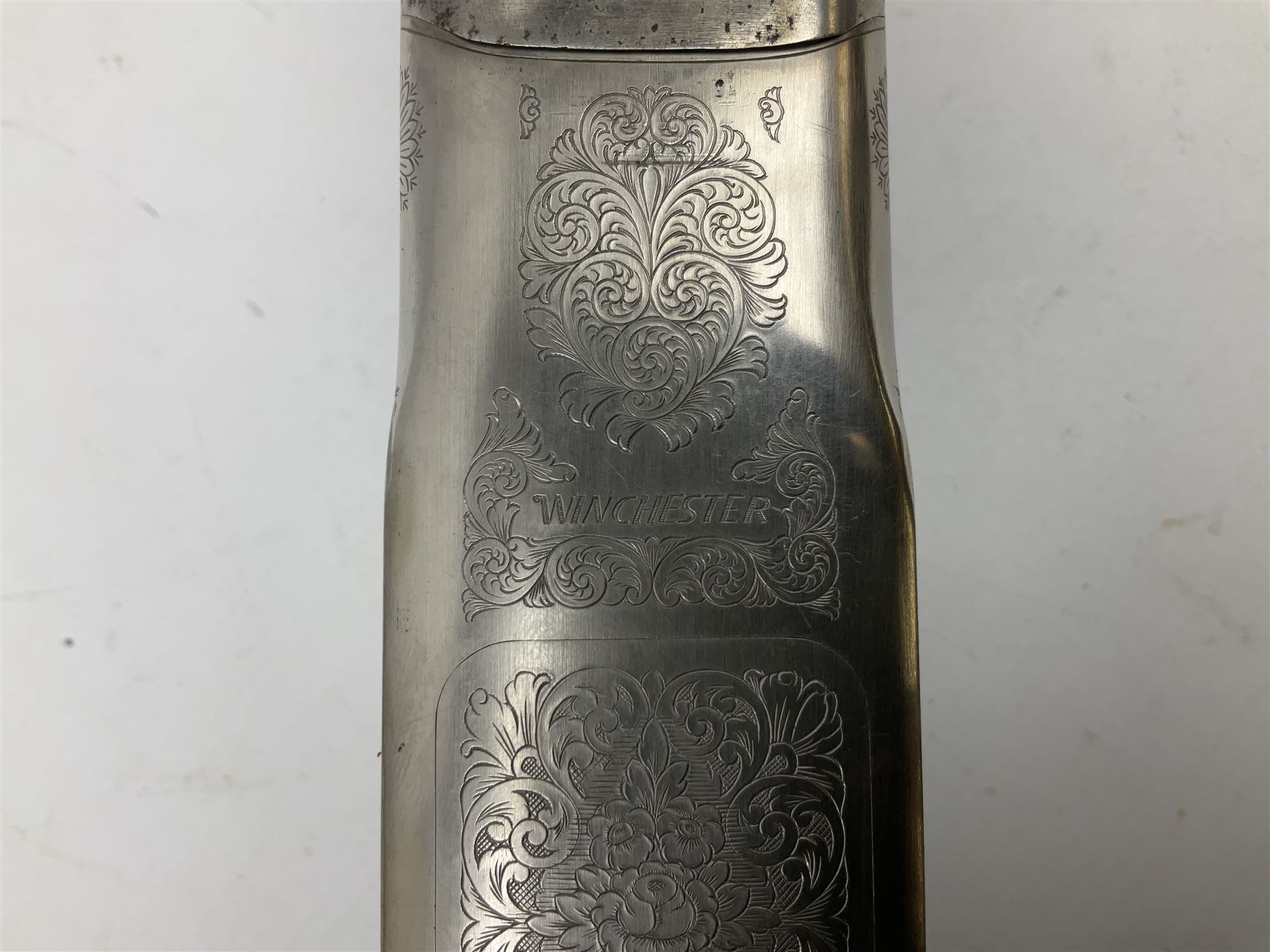 Winchester Japan 5500 12-bore by two-and-three quarters over-and-under double barrel boxlock ejector sporting gun, with 71cm barrels, ventilated rib and barrels, the walnut stock with chequered pistol grip and fore-end, single selective trigger and top safety, serial no.K542927E, L115cm overall; in gun sling SHOTGUN CERTIFICATE REQUIRED