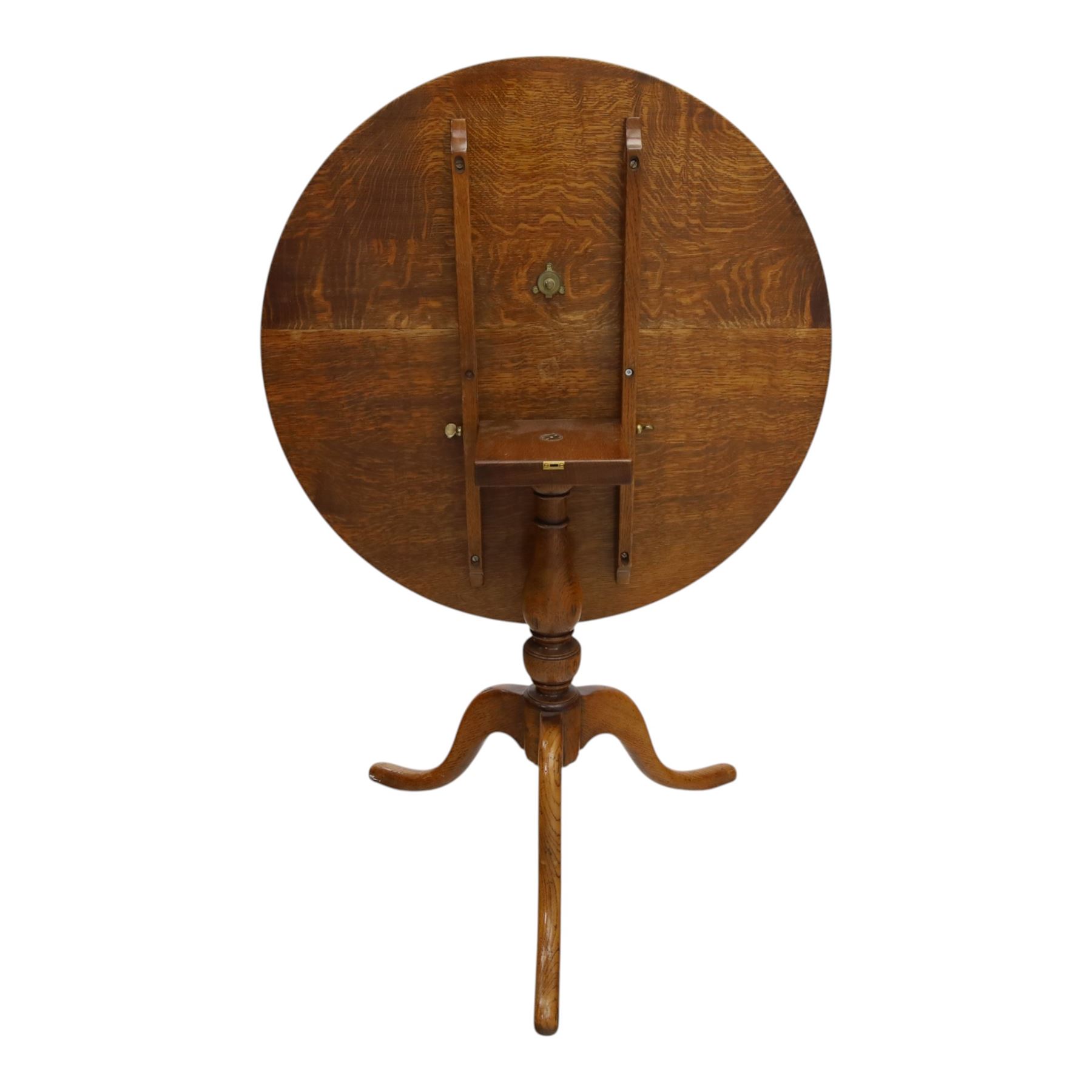 Traditional design golden oak tilt-top tripod table, brass fittings, turned baluster column on splayed supports