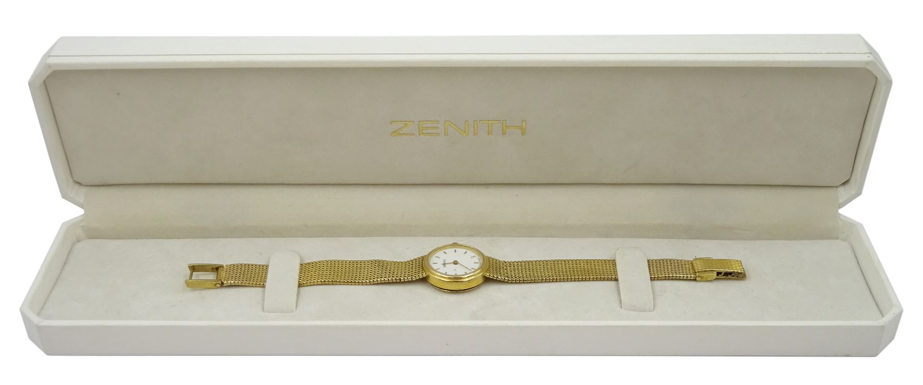 Zenith ladies 9ct gold quartz wristwatch, white enamel dial with baton hour markers, on integral 9ct gold bracelet strap