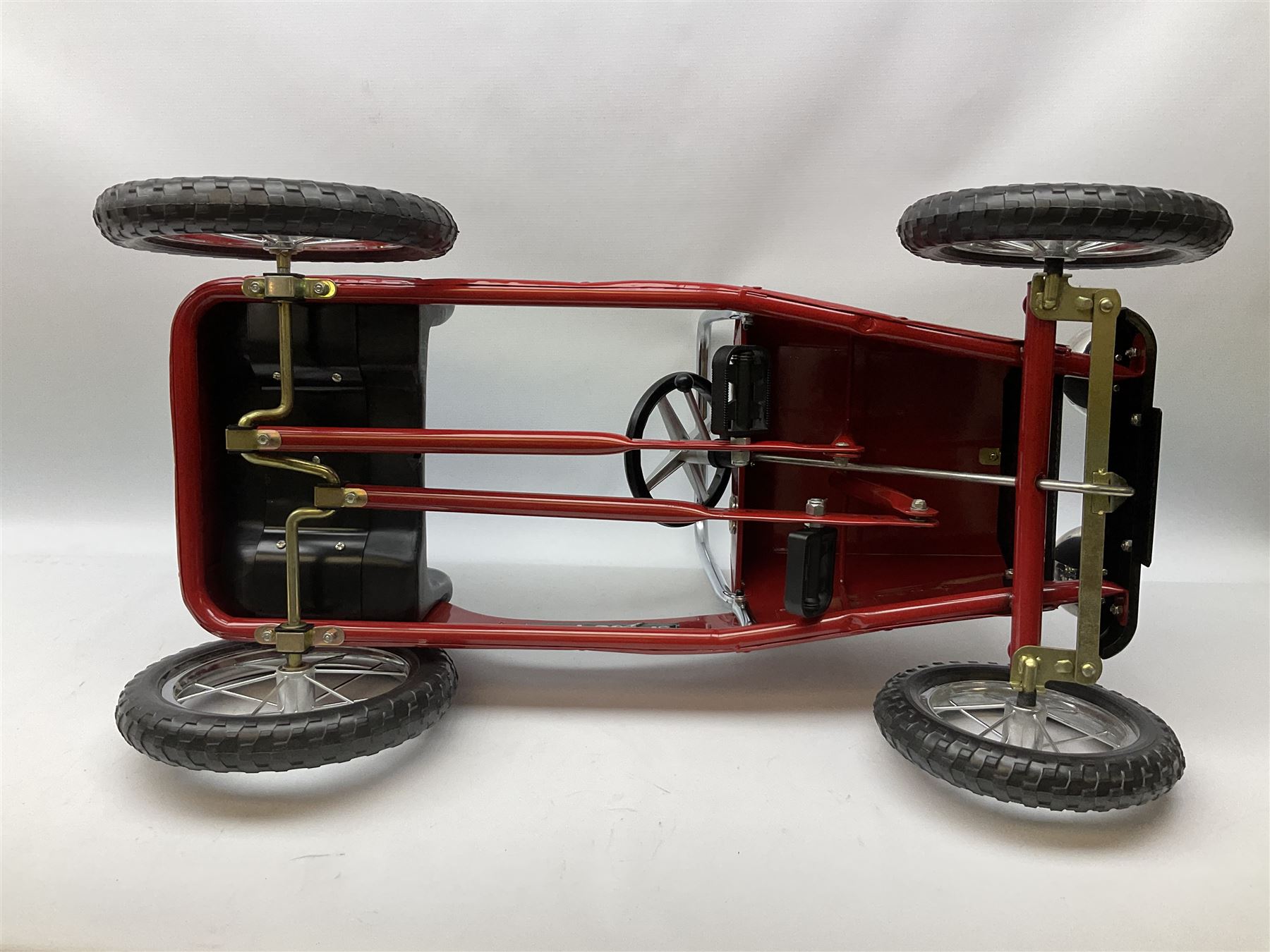 Red child's tin-plate pedal car with chrome detail, by Posh Paddles, Scarborough, H56cm, L80cm