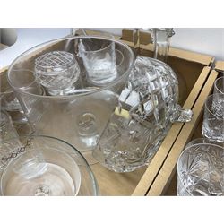 Collection of glassware, to include foot bowl with matching dishes, claret jug, three cut glass decanters, ser of wine glasses etc, in two boxes